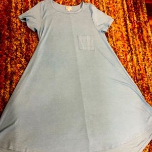 LuLaRoe Carly dress size medium. It’s a solid blue color. In excellent condition